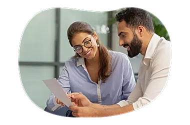 Two people comparing insurance quotes