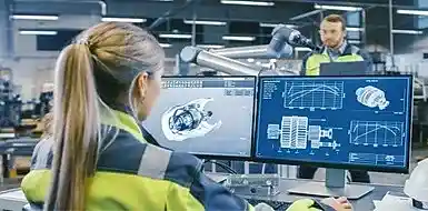 An engineer reviewing project details on their computer