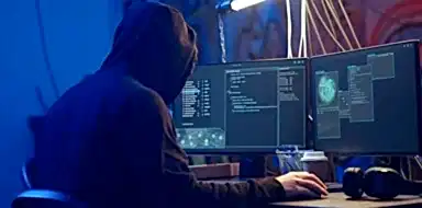 Cyber criminal hacking other computers.