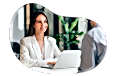 Financial advisor going through finance planning with client.
