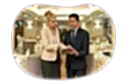 Banquet hall employees going over an event itinerary.