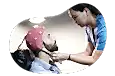 EEG technician preparing a patient for examination.