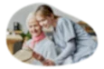 Home healthcare provider working with a patient.