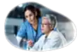 Physician assistant going over research with a physician.