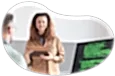 An education tech consultant reviewing software code with a programmer.