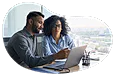 IT consultant working with a client.