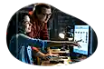 Two employees for a managed service provider (MSP) collaborate on a project.