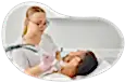 Medical spa employee treating a client.