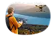 Aerial drone photographer taking a picture of a landscape.