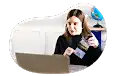 Travel agent assisting a client on a call.
