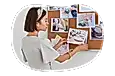 A wedding planner assembles a storyboard for a client's wedding.
