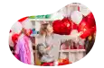 The owner of a party supply store arranging red and white balloons.