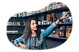 Tobacco shop employee helping a customer find a product on a shelf.
