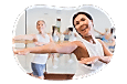 Students practice their moves at a dance studio.