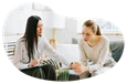 Mental health counselor supporting a patient in an office.