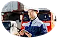 A dump truck business manager directing dump trucks on site.