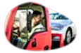 Tow truck driver hauling a client car.