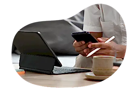A small business owner calculating their small business insurance payments
