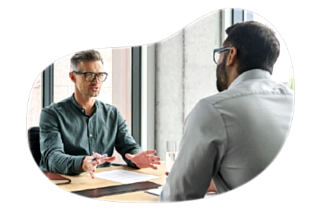 A small business owner showing proof of fidelity bonds to a client