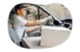 A small business owner delivering a customer's order in their personal vehicle