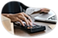 A small business owner calculating their inland marine insurance costs