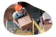 A worker putting away inventory in a warehouse
